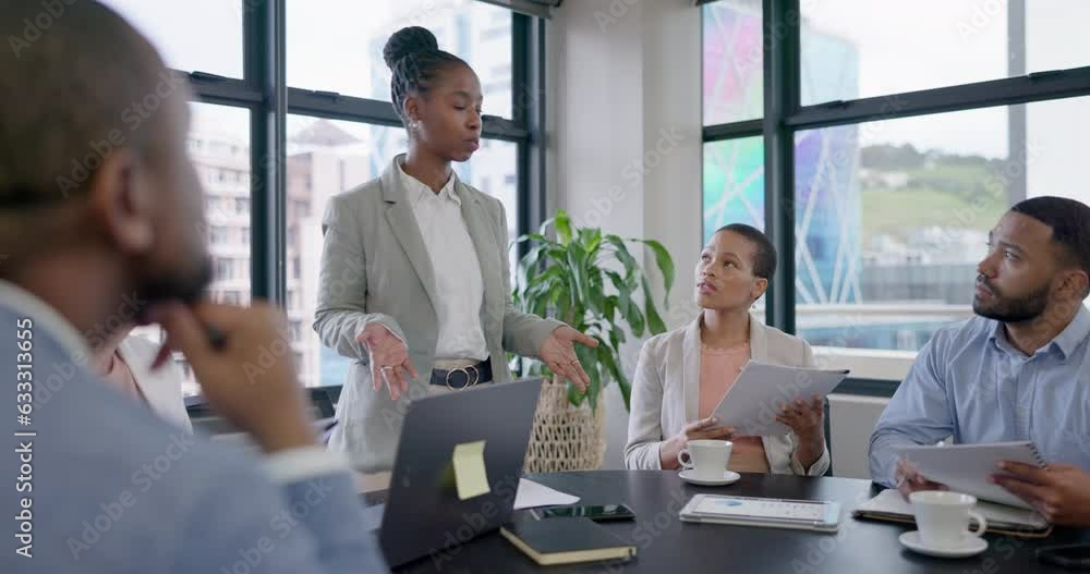 Black woman, speaker talking or business people in meeting planning our vision, mission or strategy in office. Presentation, leadership or manager speaking in discussion for sales growth in startup