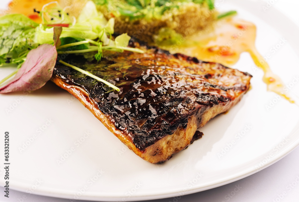 Fish dish - fried fish fillet and vegetables Fish dish - fried fish fillet and vegetables