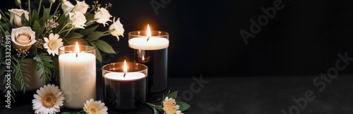 Foto Burning candles and flowers on black background with space for text an obituary, list of dead