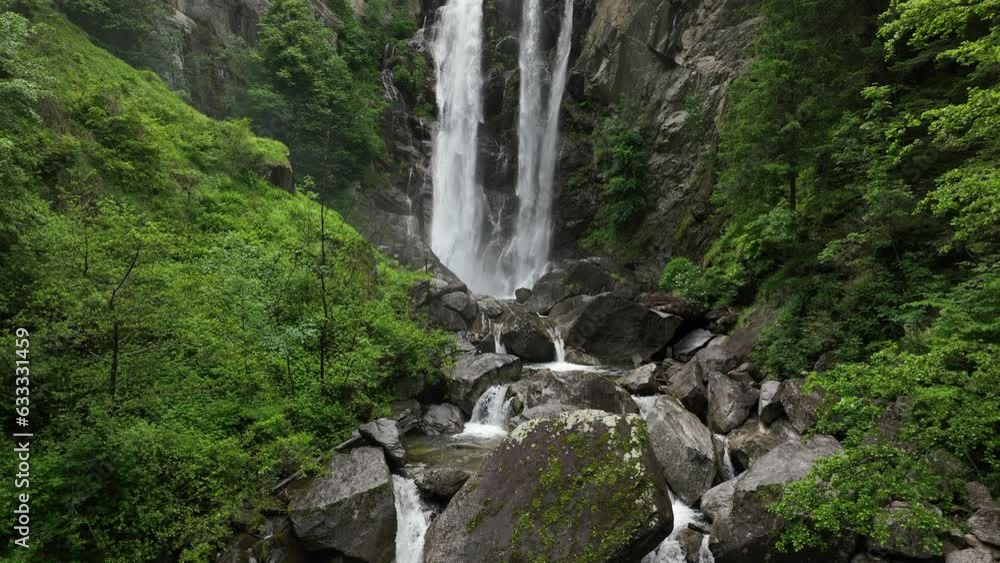 Cascata di Valclava or Kalmtaler Wasserfall waterfall in South Tirol Italy during a beautiful springtime day in the Alps. The river Kalmbach is falling down in the midst of a dense forest Cascata di Valclava or Kalmtaler Wasserfall waterfall in South Tirol Italy during a beautiful springtime day in the Alps. The river Kalmbach is falling down in the midst of a dense forest