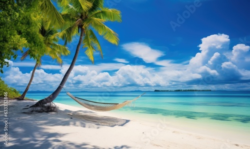 A peaceful hammock between two swaying palm trees on a pristine tropical beach
