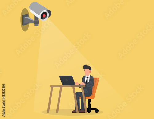 Corporate Control. Businessman sitting at his desk with a surveillance camera spying on him.