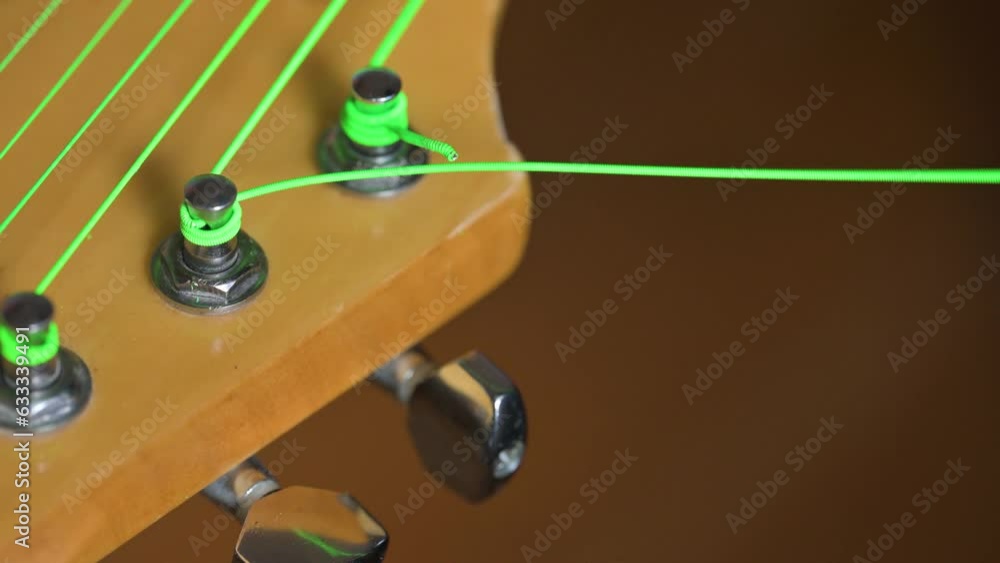 Man plug out the guitar cord into electric guitar. 4k video footage UHD 3840x2160 Man plug out the guitar cord into electric guitar. 4k video footage UHD 3840x2160