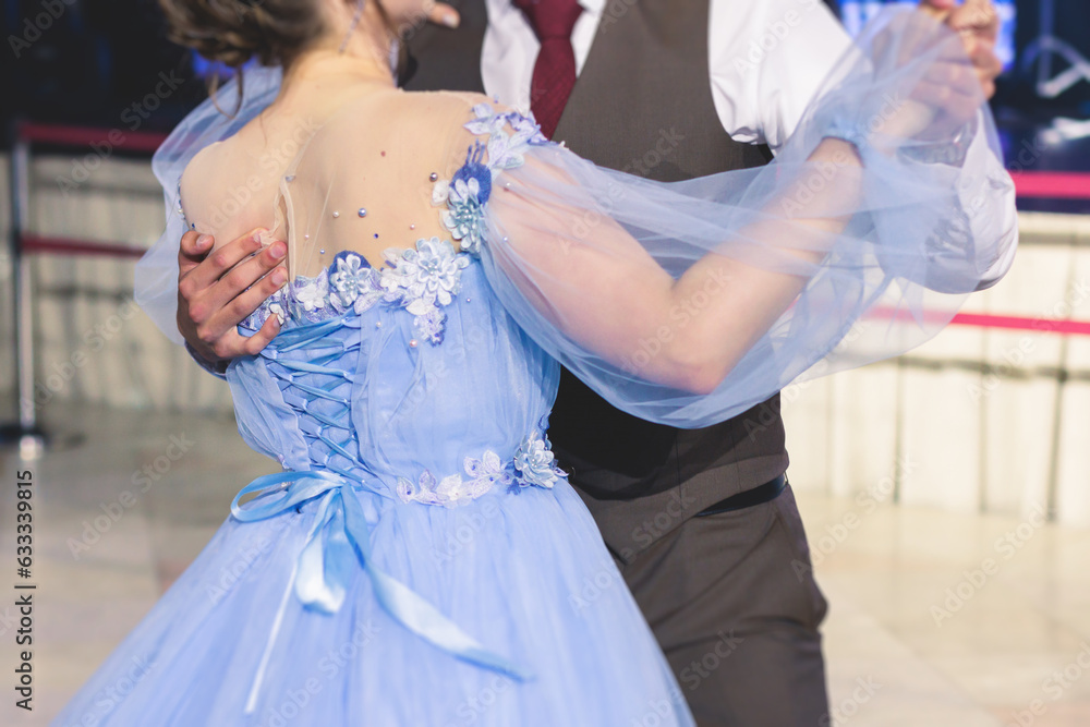 High school graduates dancing waltz and classical ball dance in dresses and suits on school prom graduation, classical ballroom dancers dancing, waltz, couples quadrille and polonaise High school graduates dancing waltz and classical ball dance in dresses and suits on school prom graduation, classical ballroom dancers dancing, waltz, couples quadrille and polonaise