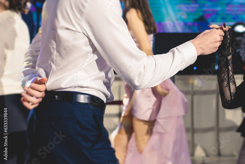 High school graduates dancing waltz and classical ball dance in dresses and suits on school prom graduation, classical ballroom dancers dancing, waltz, couples quadrille and polonaise