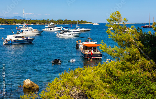 Ile Sainte Marguerite and Saint Honorat island panorama with and yachts on Mediterranean Sea waters offshore Cannes at French Riviera in France