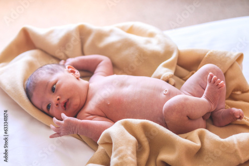 newborn lying unclothed