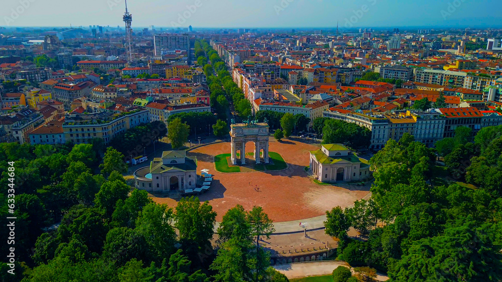 Naklejka premium Gate Sempione Porta Sempione city gate to Lombardy in the fall. Arch of Peace. Arco della pace. sunny evening in milan city park aerial panorama 4k italy milano city triumphal arch. Sculptures