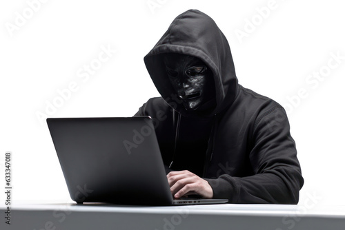 A hacker in black hoodie is working on his laptop on a white desk.