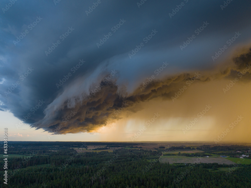 Giant thunderstorm clouds with supercell wall cloud, summer, Lithuania Giant thunderstorm clouds with supercell wall cloud, summer, Lithuania