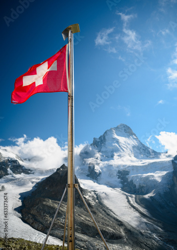 swiss flag at Cabane du Mountet in front of Dent Blanche, Valais photo