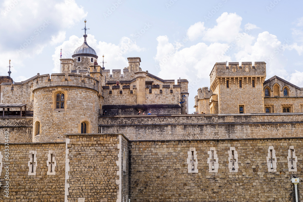 London, United Kingdom, 21 june 2023:The Tower of London,  a castle and a former prison River Thames museum International Landmark architecture cloudy  Europehis majesty's royal palace and fortress