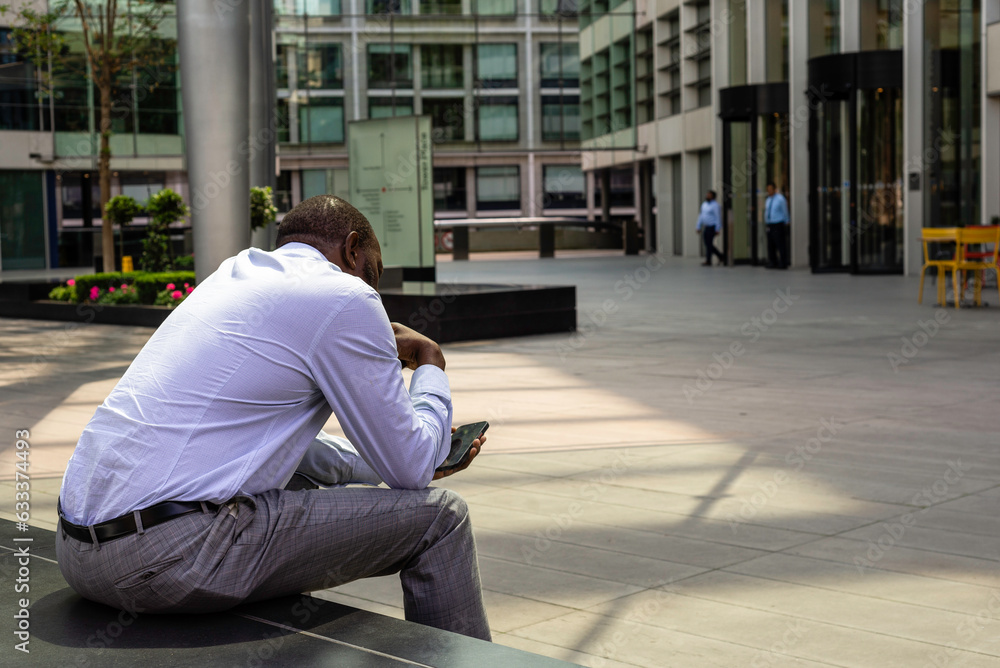 handsome caucasian Portrait business person with mobile phone Smiling young businessman city  London  outdoors concept coffee break financial district street  male work office Marsh McLennan