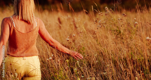 Obraz na płótnie Unity With Nature. Yoga Concept Lifestyle. Healthy Lifestyle Concept. Young Pretty Caucasian Happy Girl Woman Walking At Summer Meadow. Calmness And Tranquility. Power Of Women. Stress Less. w salonie