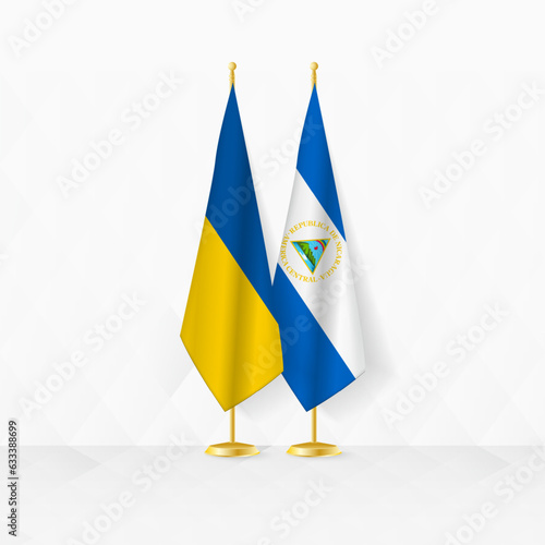 Ukraine and Nicaragua flags on flag stand, illustration for diplomacy and other meeting between Ukraine and Nicaragua.