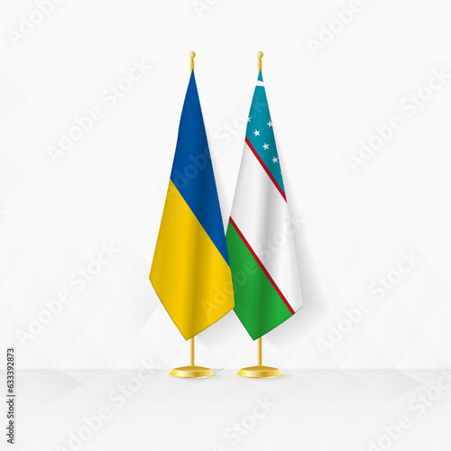 Ukraine and Uzbekistan flags on flag stand, illustration for diplomacy and other meeting between Ukraine and Uzbekistan.