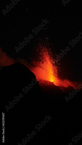 View on erupting Stromboli volcano, by night, on august 2023