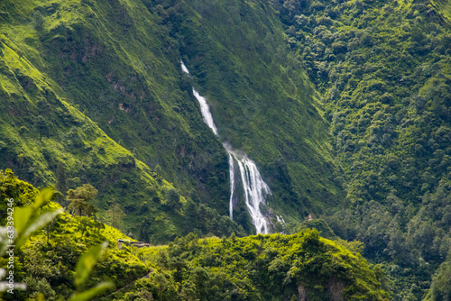 Beautiful Waterfall in the Green Hill Mountain during Monsoon in Tatopani, Nepal