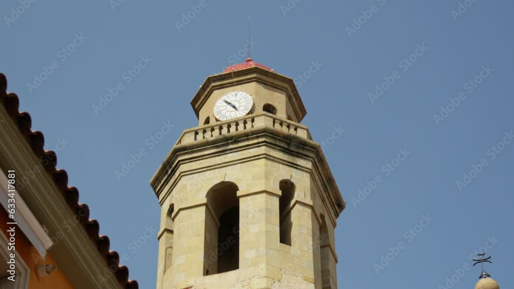 View of the clock tower in the city of Colella View of the clock tower in the city of Colella