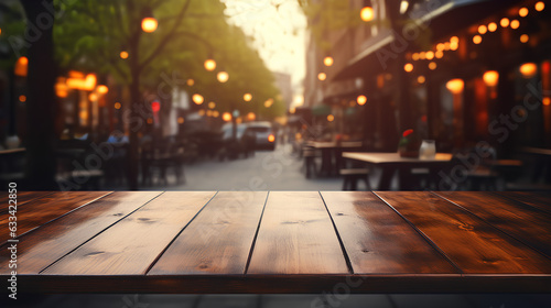 Empty wooden table for product placement or montage with shop front window blurred background