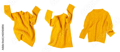 Cut out yellow orange flying women's autumn knitted sweater isolated on white background. With clipping path. Clothing concept, trendy fall winter cozy sweater pullover jersey