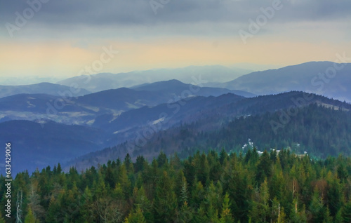 View to the south east from the tower on the Gorc mountain in Gorce (Poland) on a cloudy April day. In the distance Lubań (on the right) © IwoiWo