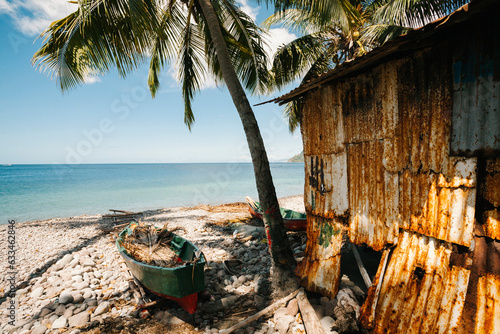 Ocean view with fishing hut and boats beached on shore, Scotts Head, Soufriere, Dominica, Caribbean