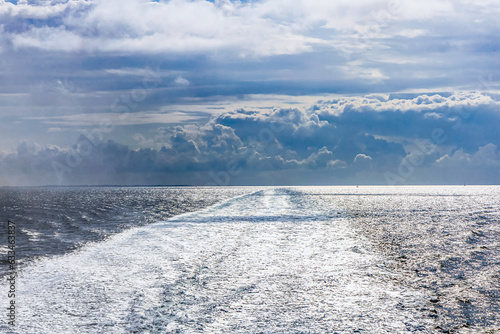 Water trail behind cruise ship. © Natalia