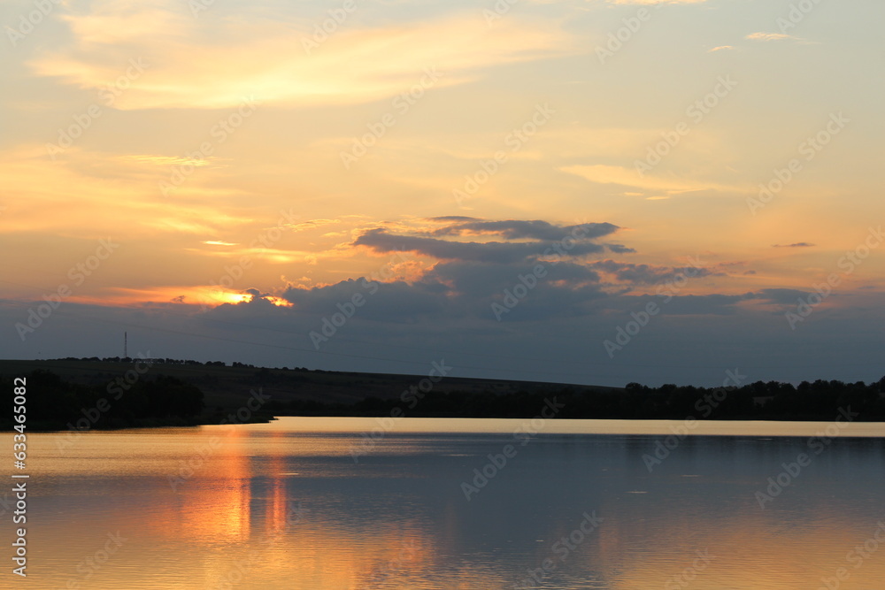 A sunset over a lake