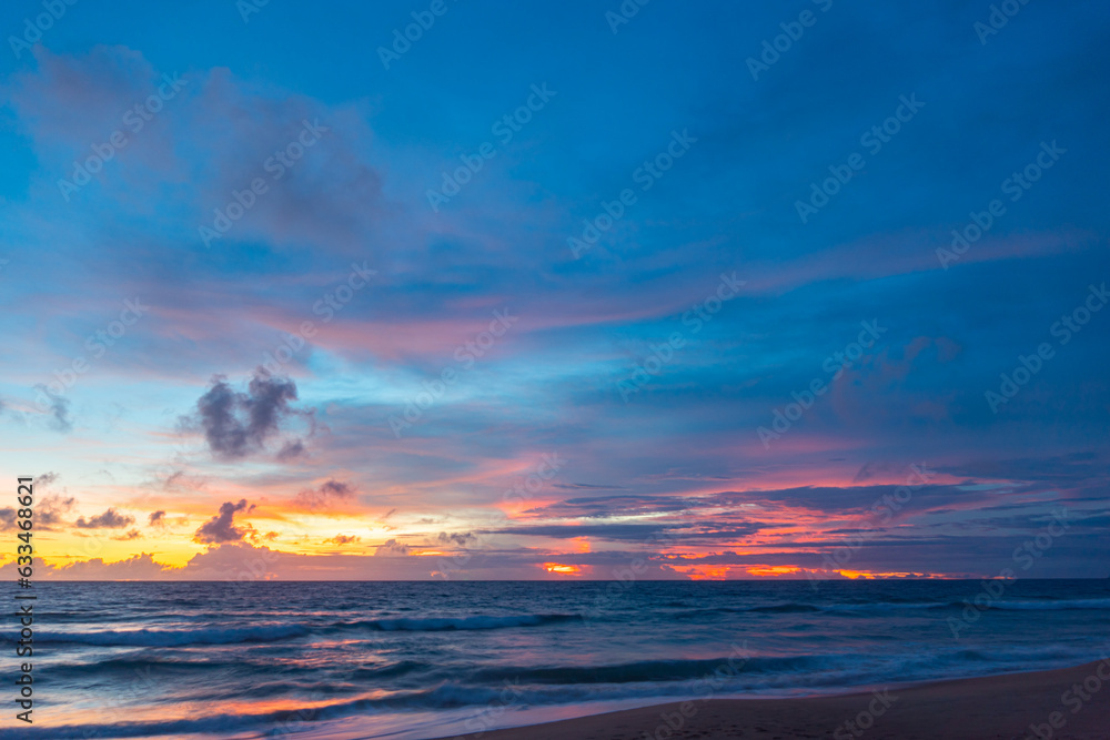 Scene of colorful pink light trough in the sky above the ocean..Scene of colorful red light trough in the dark blue sky..Gradient color. Sky texture, abstract nature background.