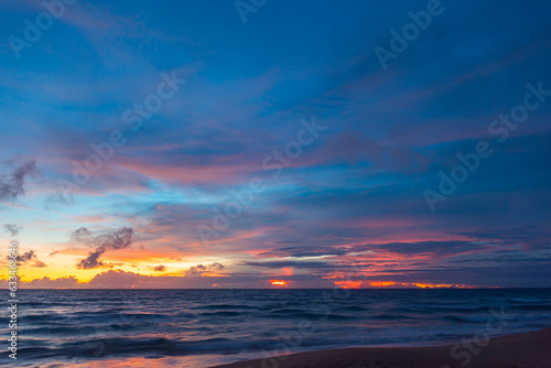 Scene of colorful pink light trough in the sky above the ocean..Scene of colorful red light trough in the dark blue sky..Gradient color. Sky texture  abstract nature background.