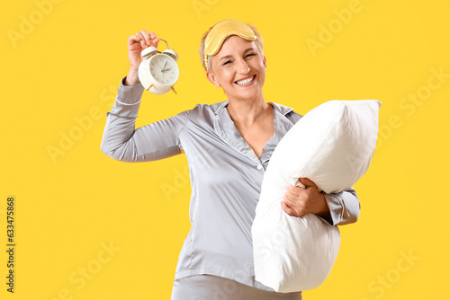 Mature woman in pajamas wit...