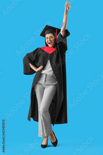 Happy female graduate stude...