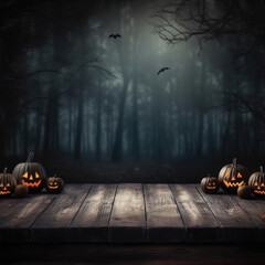 Halloween background.pumpkins and fallen leaves on wooden background. Scary halloween pumpkin
