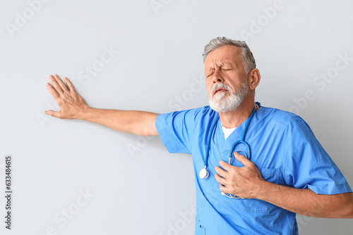 Mature doctor having heart ...