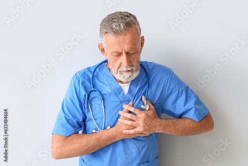 Mature doctor having heart ...