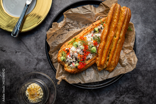 eclair overhead shoot stuffed with caviar