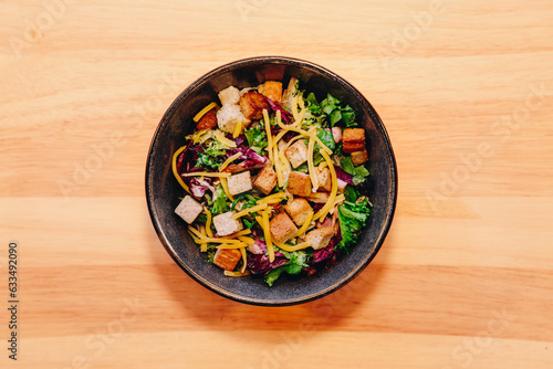 caesar salad in a bowl, healthy and vegetarian restaurant food