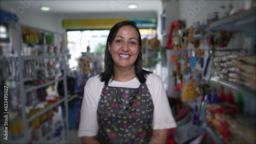 Cuadro en lienzo Happy Local Pet Shop Female Owner Portrait face close-up standing inside inside Store smiling