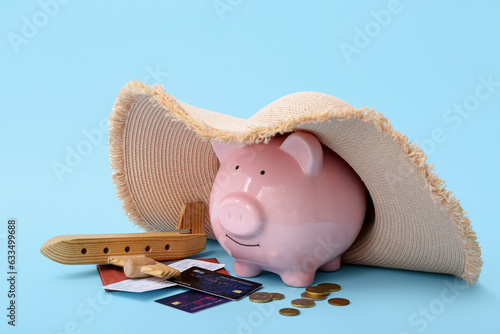 Piggy bank with wicker hat,...