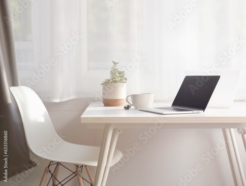 Desktop with laptop and cup of coffee  in front of a window with morning sunlight. Generative AI.  Home cozy office concept in scandinavian style © Kufotos