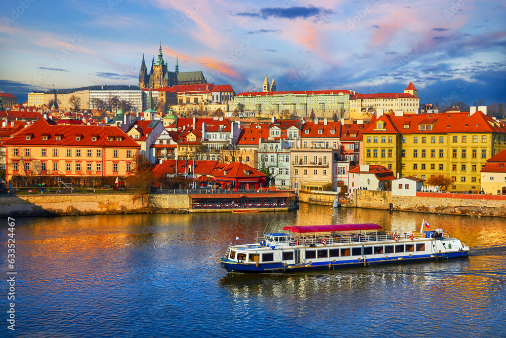 Old town of Prague, Czech Republic over river Vltava with Saint Vitus cathedral on skyline. Bright sunny day with blue sky. Praha panorama landscape view