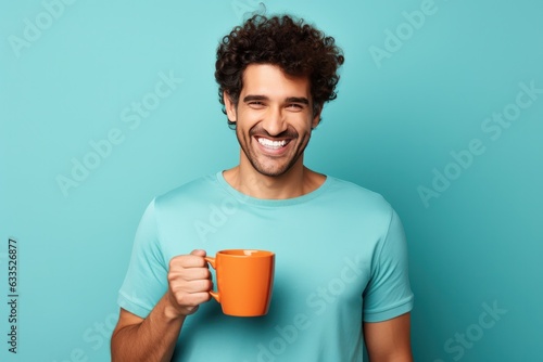 Happy man with cup of coffee
