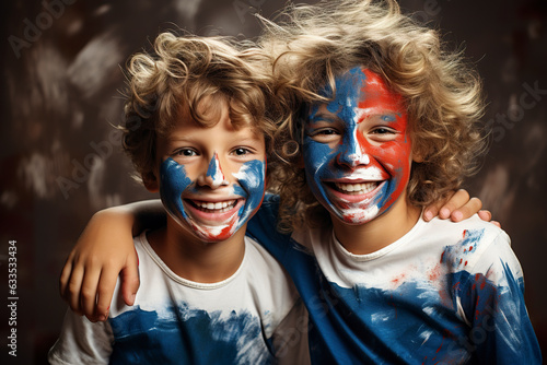 Happy children proudly display painted faces adorned with the French flag, a simple yet powerful display of youthful patriotism and joy. France flag colors in face paint.