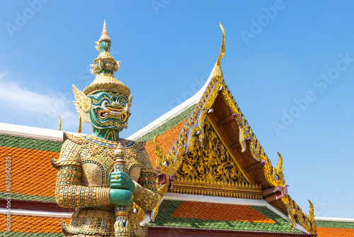Giant demon guardian statue at Wat Phra Kaew or Emerald Buddha temple, Bangkok, Thailand