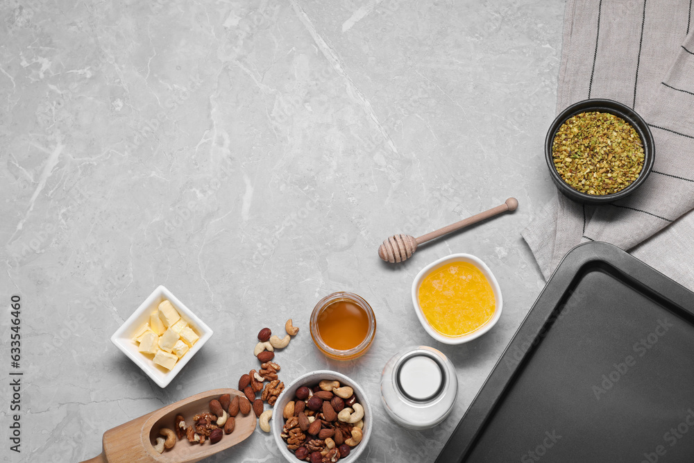 Ingredients for making delicious baklava on grey textured table, flat lay. Space for text Ingredients for making delicious baklava on grey textured table, flat lay. Space for text