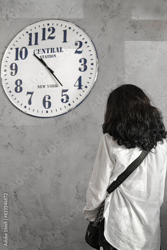 person with clock