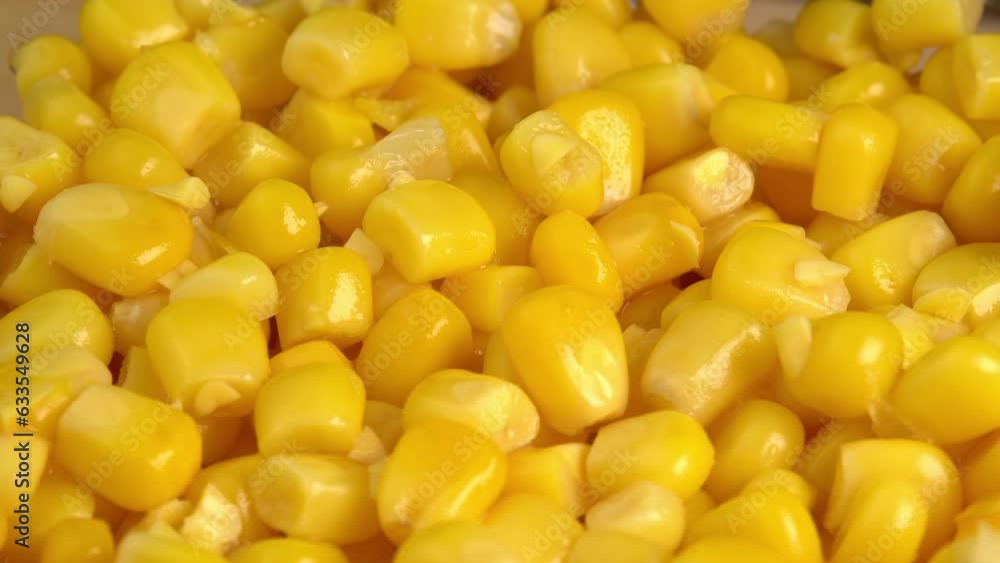 Sweet corn kernels macro rotate like a background. Ingredient for mexican salad filled with vitamins Sweet corn kernels macro rotate like a background. Ingredient for mexican salad filled with vitamins