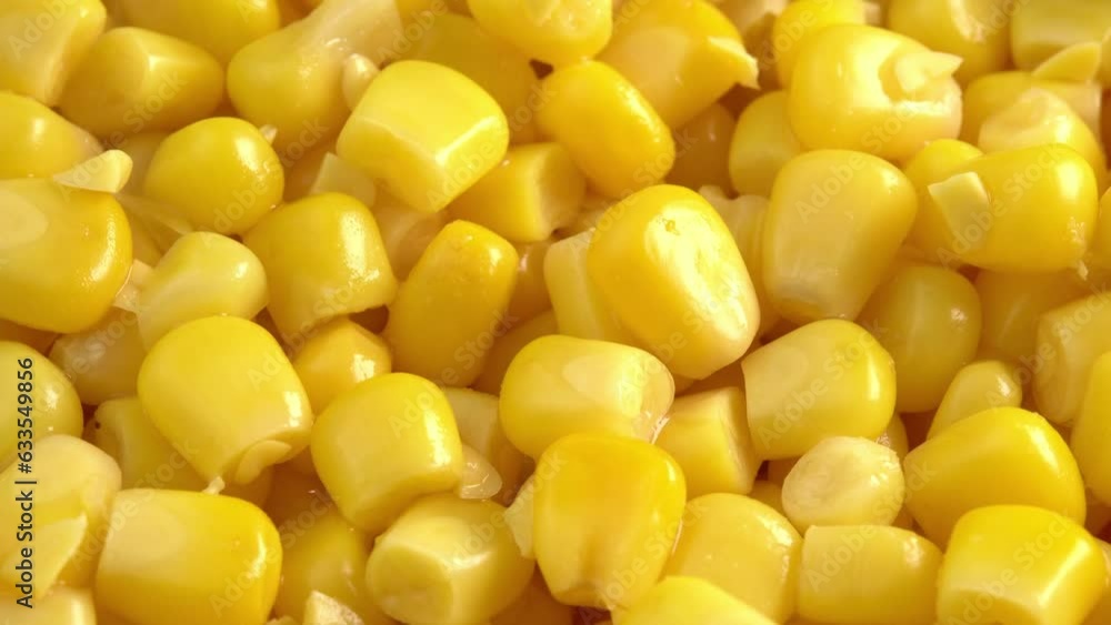 Sweet corn kernels macro rotate like a background. Ingredient for mexican salad filled with vitamins Sweet corn kernels macro rotate like a background. Ingredient for mexican salad filled with vitamins