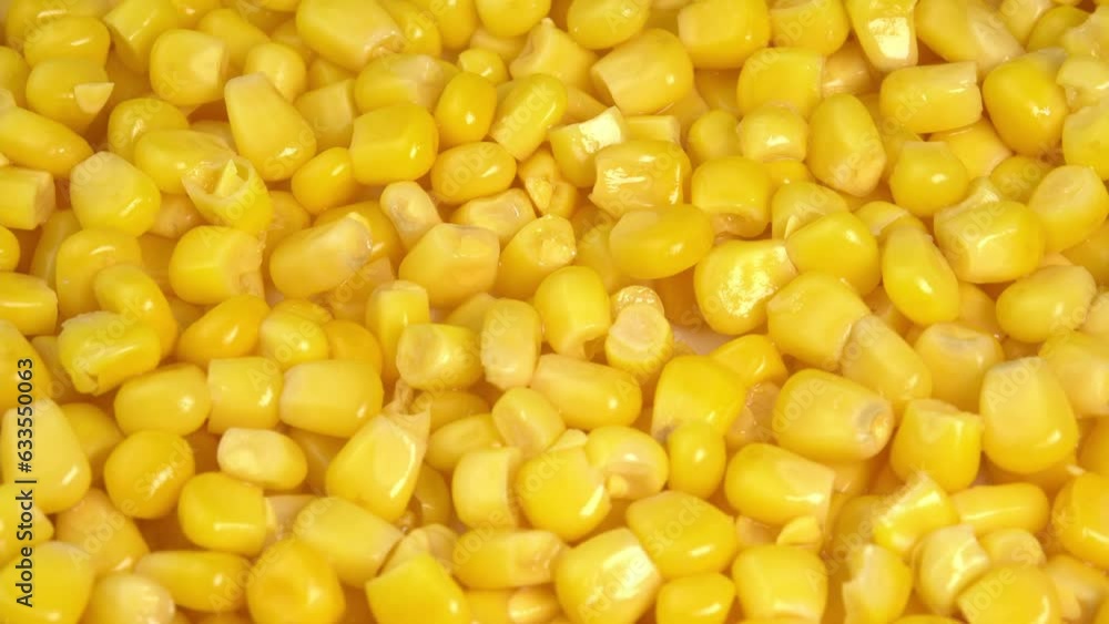 Sweet corn kernels macro rotate like a background. Ingredient for mexican salad filled with vitamins Sweet corn kernels macro rotate like a background. Ingredient for mexican salad filled with vitamins